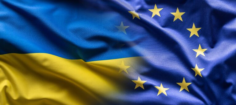 Ukrainian and the EU flag blending into each other as European Union leans towards the membership of Ukraine